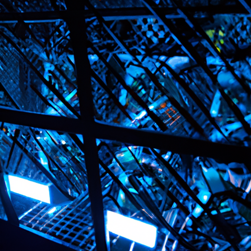 Close-up of an ASIC miner undergoing a firmware update to enhance mining efficiency