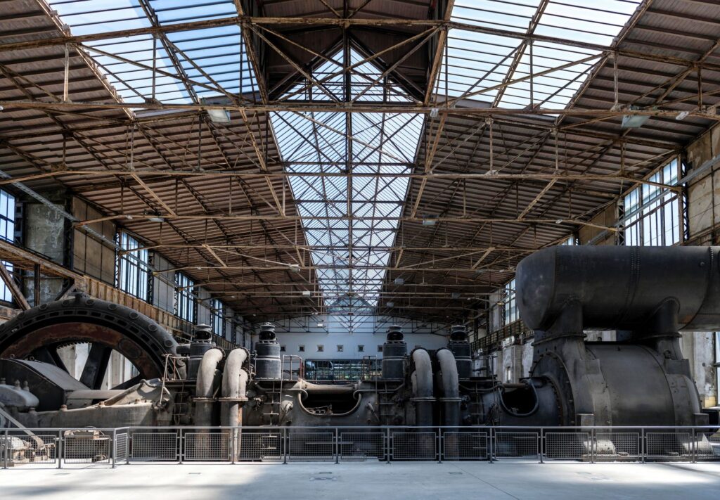 Interior view of a historic industrial facility in Hattingen, showcasing vintage steel equipment.